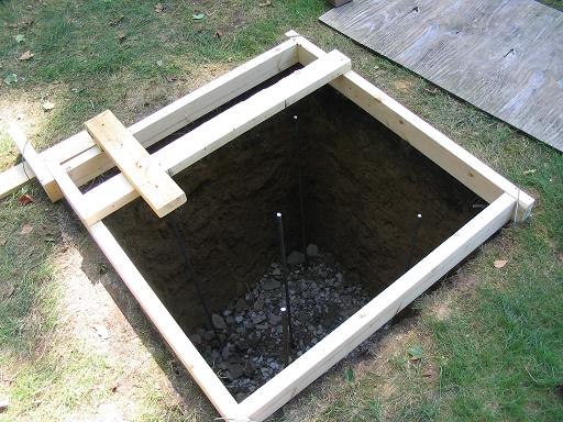 The hole with the rebars and frame